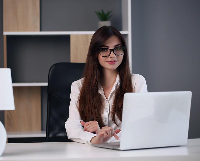 Employee with white laptop